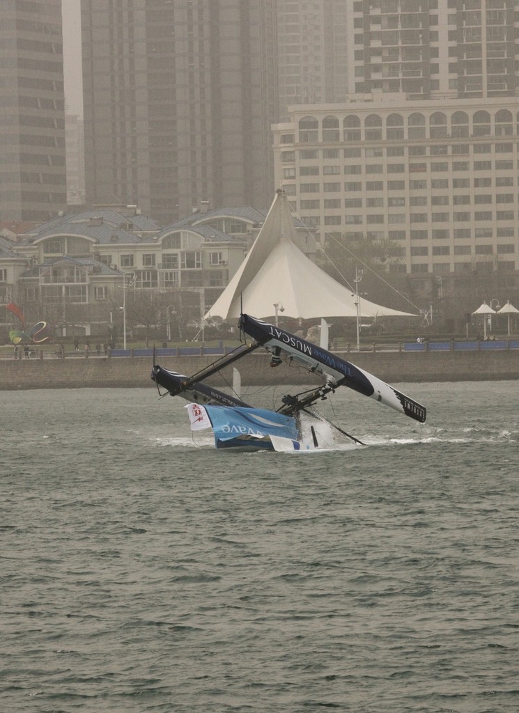 The Wave, Muscat capsize in Race 2 - Extreme Sailing 2011 - Day 3, Qingdao © Sui Zhi Qiang/Lloyd Images <br />
 © Lloyd Images http://lloydimagesgallery.photoshelter.com/