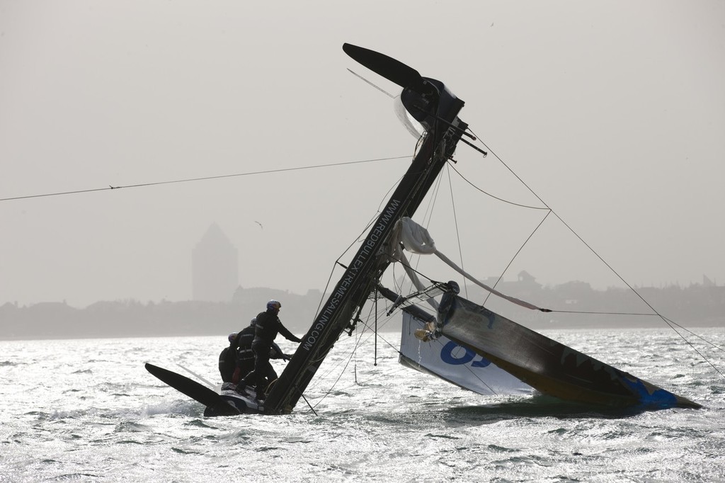 Red Bull Extreme Sailing capsize in race 4 - Extreme Sailing 2011 - Day 3, Qingdao © Lloyd Images http://lloydimagesgallery.photoshelter.com/