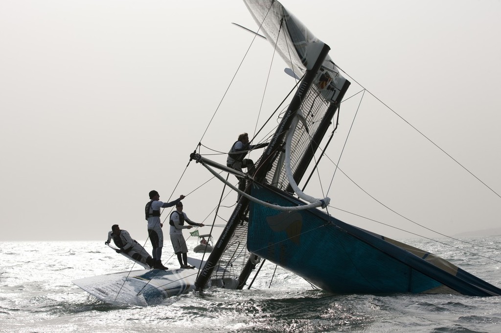 Oman Air, the fourth and final capsize - Extreme Sailing 2011 - Day 3, Qingdao © Lloyd Images http://lloydimagesgallery.photoshelter.com/