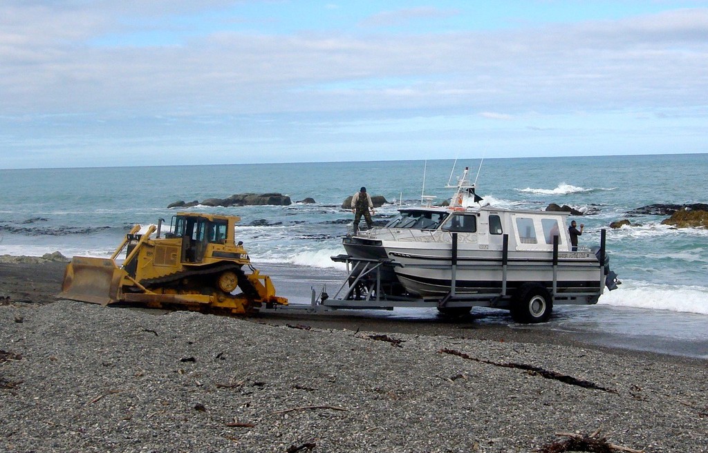 Trevor Burkhart and his family fish off the rugged East Coast of New Zealand’s South Island, where even launching the boat is an adventure. © Freddy Foote