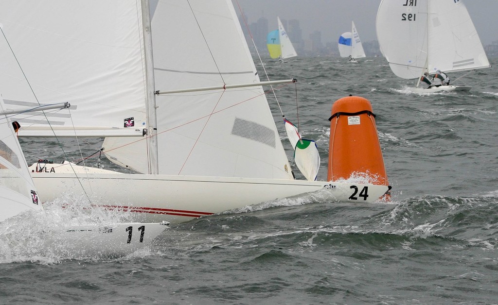 Mark Woodland from Melbourne goes around the top mark ahead of Russia’s Olga White. - Dragon World Championships &copy;  John Curnow