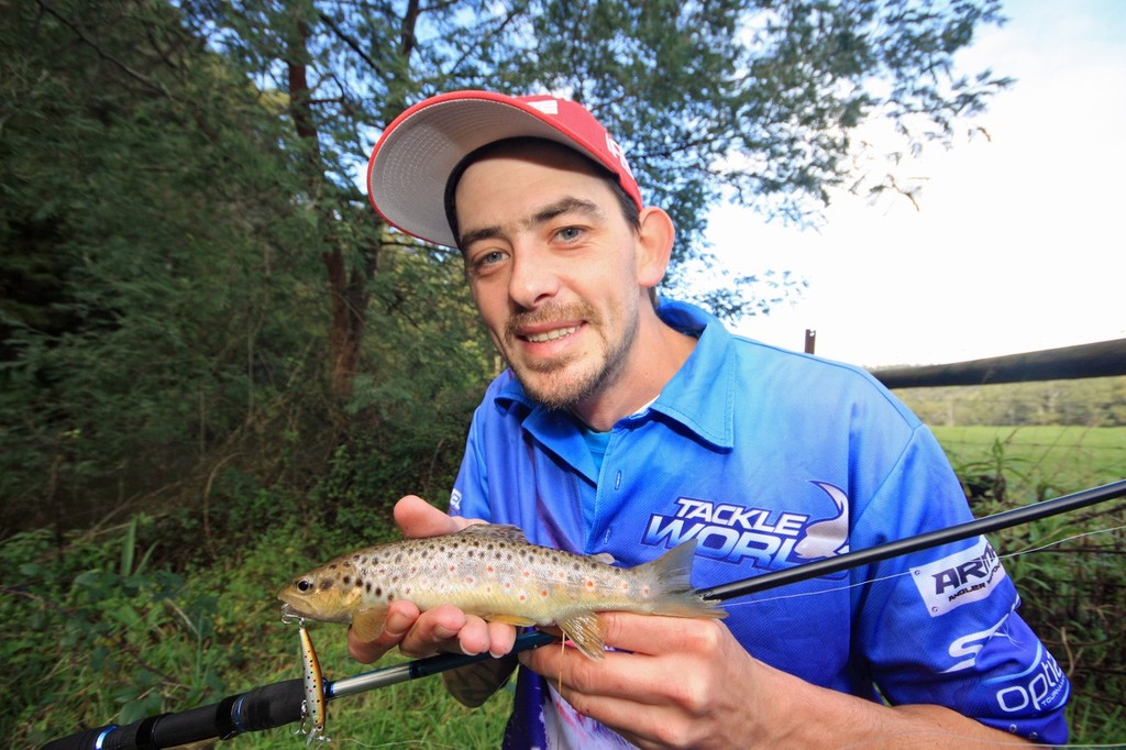 Kurt displays a small stream trout. © Jarrod Day