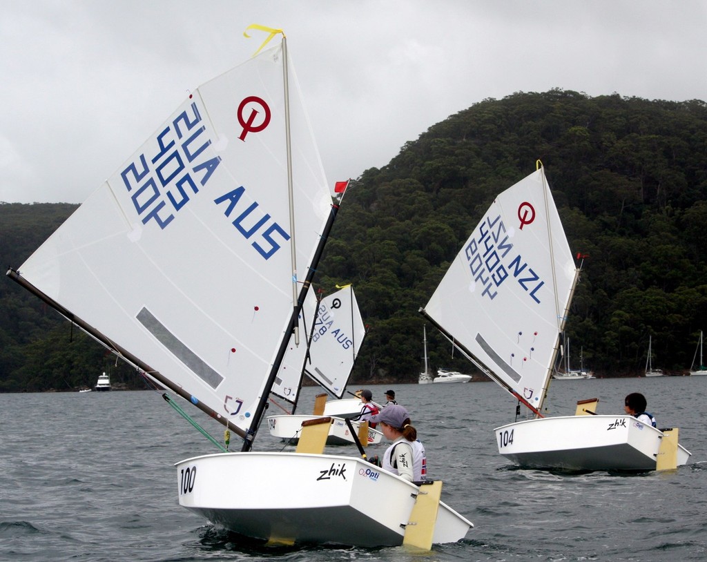 The Open Fleet leader after Day One Nia Jerwood 'Bucca Nia' chasing the leaders on the downwind run in Race Two. - 2011 International Optimist Australian & Open Championship photo copyright Damian Devine taken at  and featuring the  class