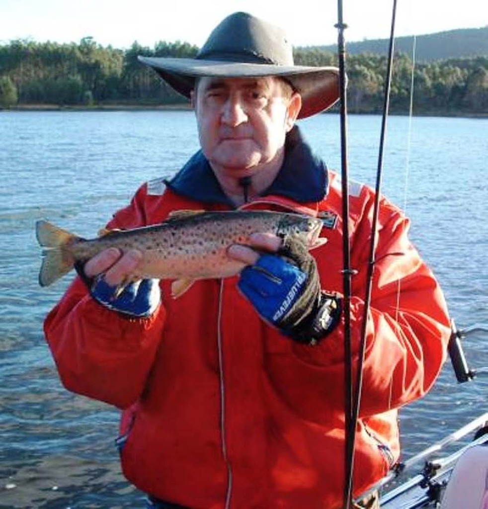 Danny and his brown trout(the fish whisperer) © Carl Hyland - copyright