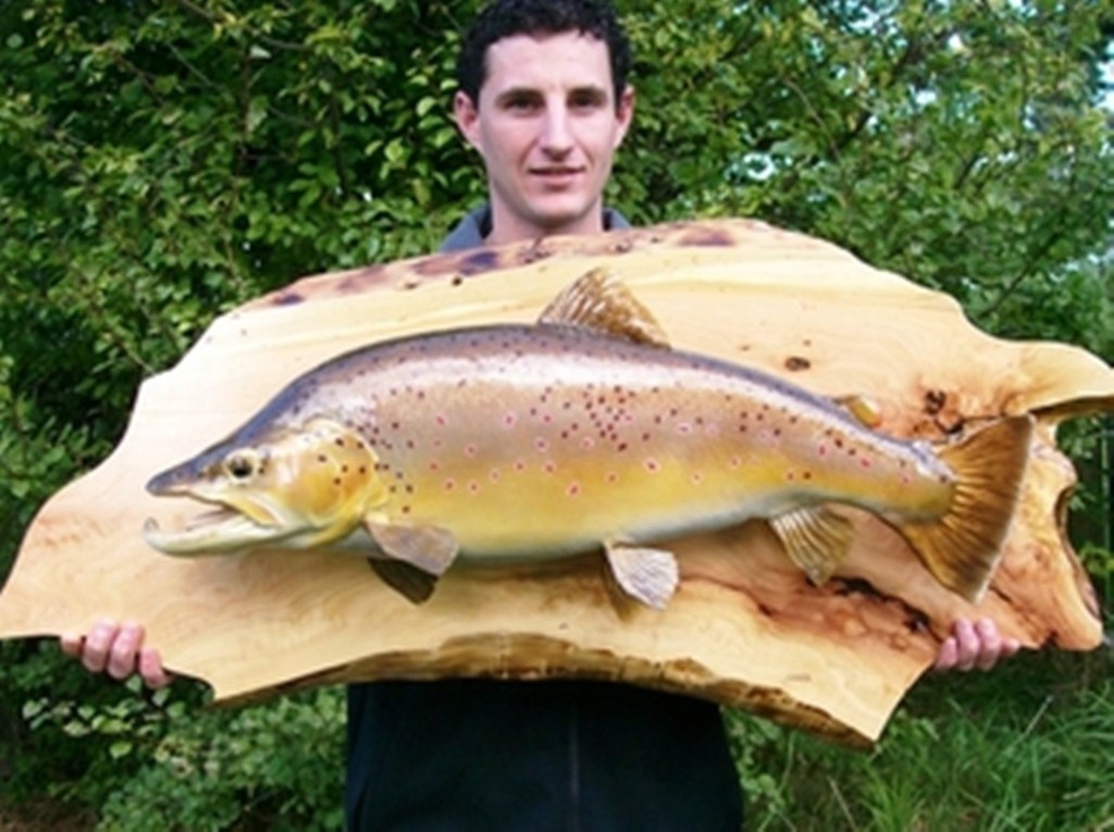 Shane and his brown trout photo copyright Carl Hyland taken at  and featuring the  class