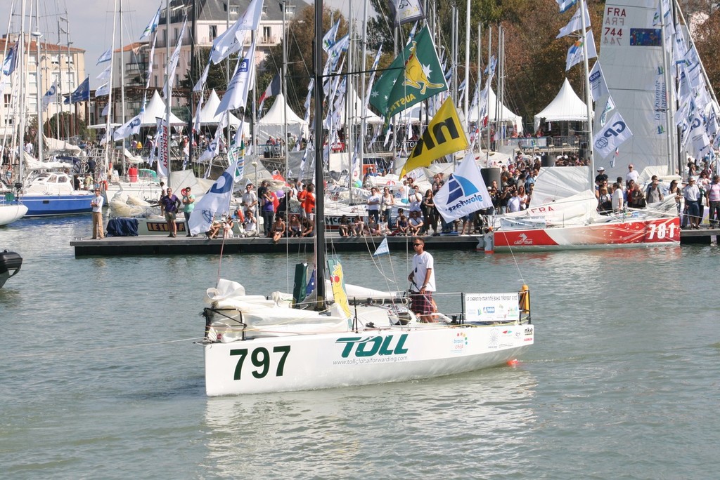 Scott being towed to the start of the La Charente-Maritime to Bahia Transat 650 - La Charente-Maritime to Bahia Transat 2011 photo copyright  Christophe Breschi taken at  and featuring the  class