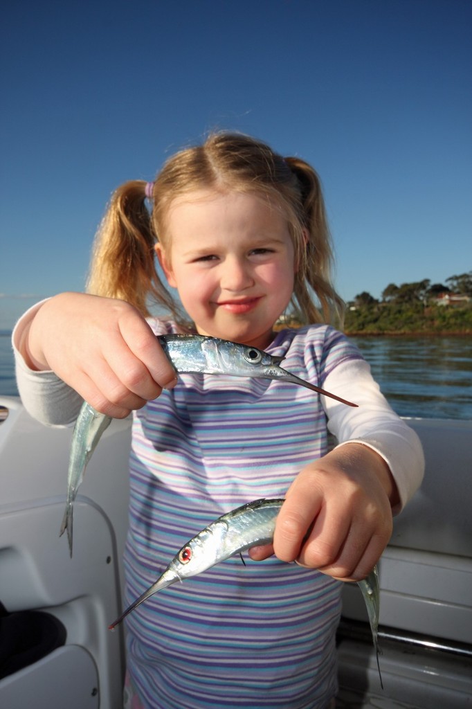 Five year old Asha-Marie Day display the fruits of a days catch. © Jarrod Day