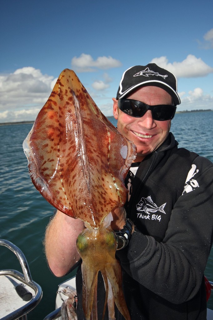 Gawaine Blake from Big Time charters with a solid calamari from Cleeland Bight. ©  Jarrod Day www.jarrodday.com