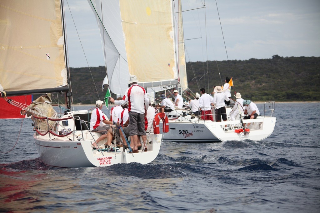 Different divisions, but soooo close!  Michael Cameron's Flying Tiger trails Tony Carter's First 40 at this point, but beat hime home at the end. - Geographe Bay Race Week 2011 © Bernie Kaaks - copyright