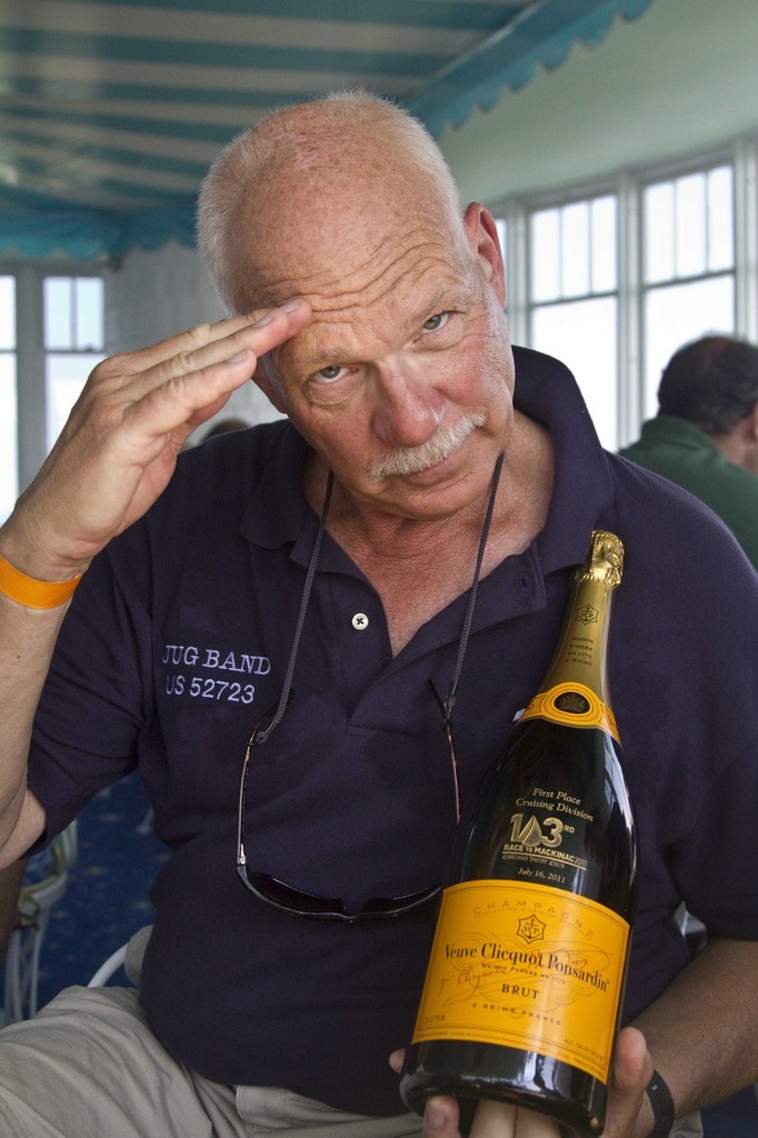 The captain celebrates with his fancy new bottle of Vueve Cliqout  - 103rd Race to Mackinac photo copyright Sean Palizza taken at  and featuring the  class