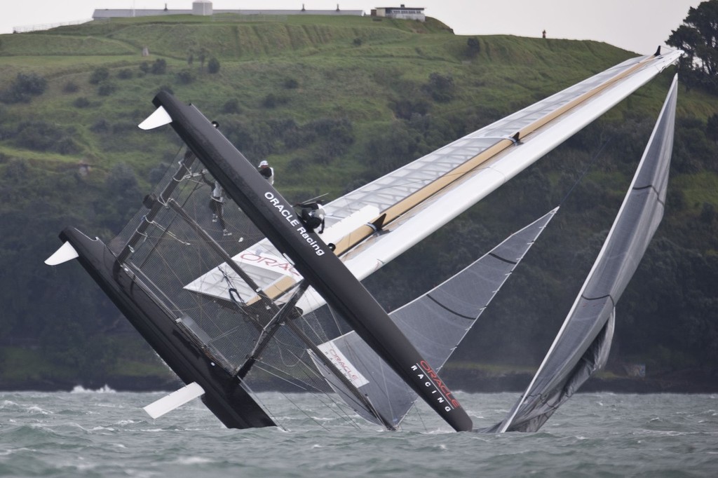 25/04/2011 - Auckland (NZL) - 34th America’s Cup - AC45 test event - Day 1 - Oracle 1 capsize and redress © OracleTeam USA www.oracleracing.com