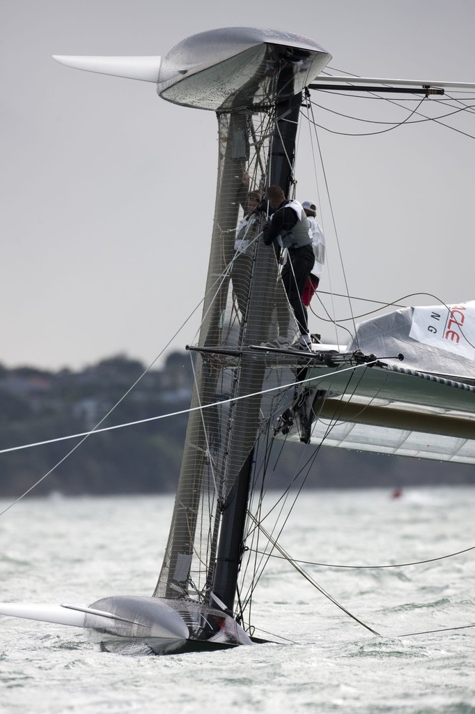25/04/2011 - Auckland (NZL) - 34th America’s Cup - AC45 test event - Day 1 - Oracle 1 capsize and redress © OracleTeam USA www.oracleracing.com