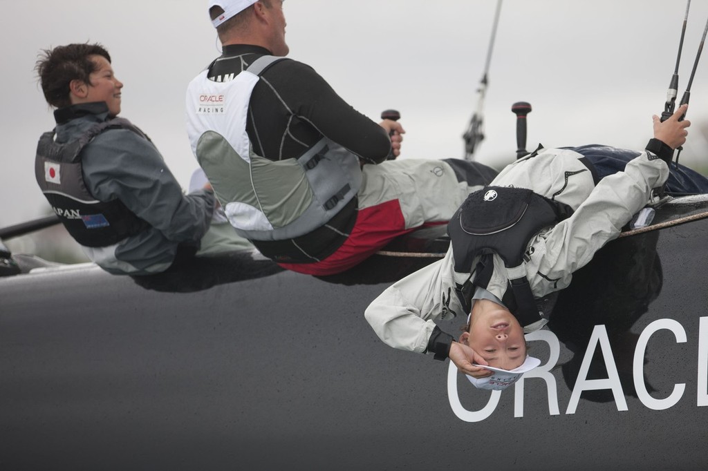 New Zealand national Optimist Champion, Leonard Takahashi-Fry on the handlebars of the AC45 photo copyright Gilles Martin-Raget/Oracle Racing.com http://www.oracleteamusamedia.com/ taken at  and featuring the  class