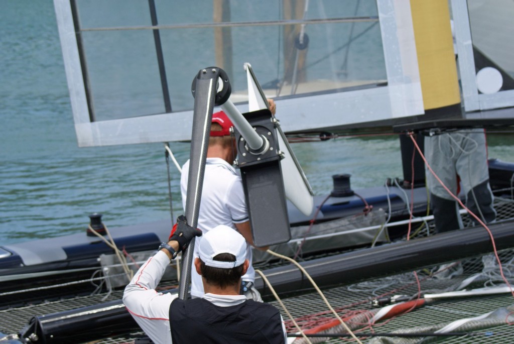 The port rudder is carried across showing the box, foil and tiller - AC45 launch - Day 2 © Richard Gladwell www.photosport.co.nz