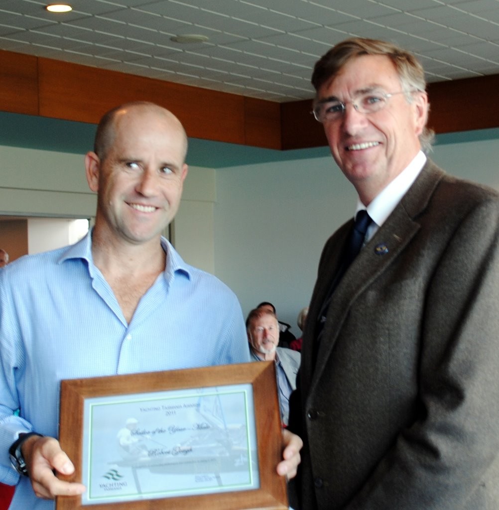 Foiler Moth sailor Robbie Gough receives his award from Yachting Tasmanian president Garry Langford - Yachting Tasmania Award 2011 photo copyright Rob Cruse taken at  and featuring the  class