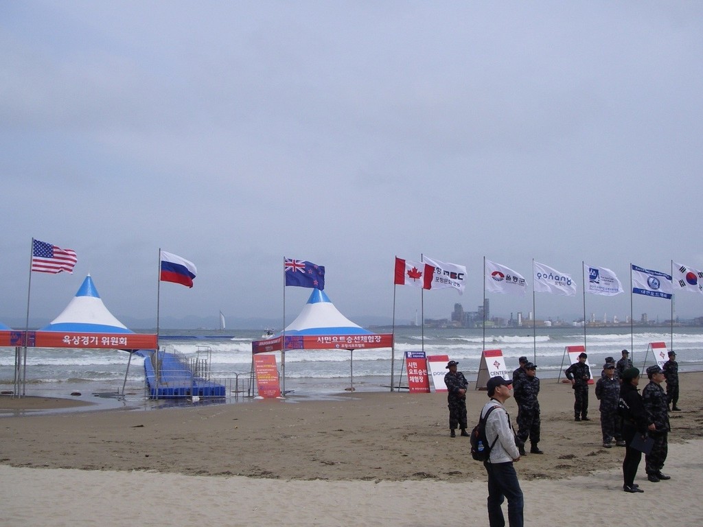 The Canadian Flag flying high at the ceremony &copy; Mike Evans