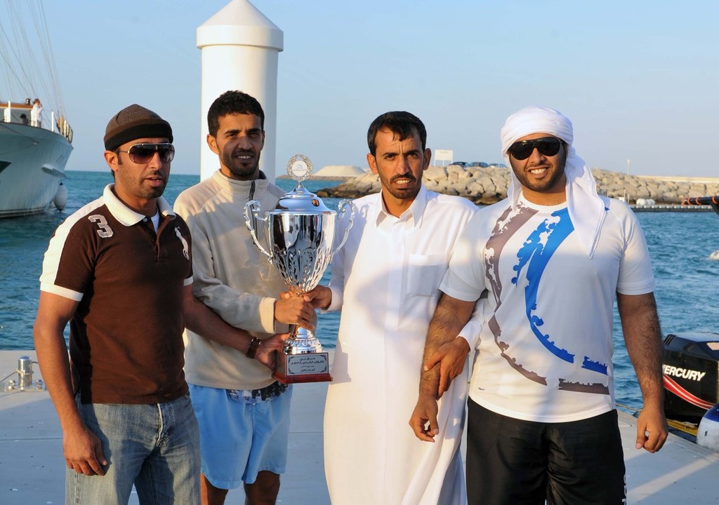 Marwan Al Tayer, left & Mohammed Rashid Bin Shaheem, 3rd from left & crew members photo copyright DIMC taken at  and featuring the  class