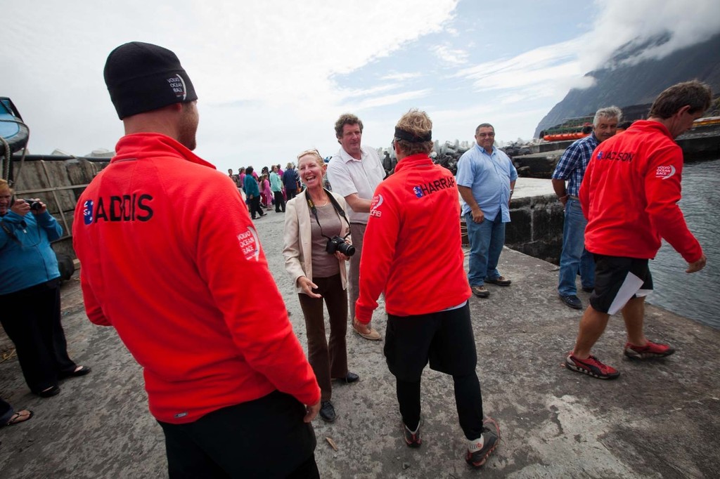 PUMA Ocean Racing powered by BERG says goodbye to the people of Tristan de Cunha before boarding the TEAM BREMEN, bound for Cape Town and the start of Leg 2, following a week of refuge on the island. Leg 1 of the Volvo Ocean Race 2011-12, from Alicante, Spain to Cape Town, South Africa. (Credit: Amory Ross/PUMA Ocean Racing/Volvo Ocean Race) photo copyright Amory Ross/Puma Ocean Racing/Volvo Ocean Race http://www.puma.com/sailing taken at  and featuring the  class