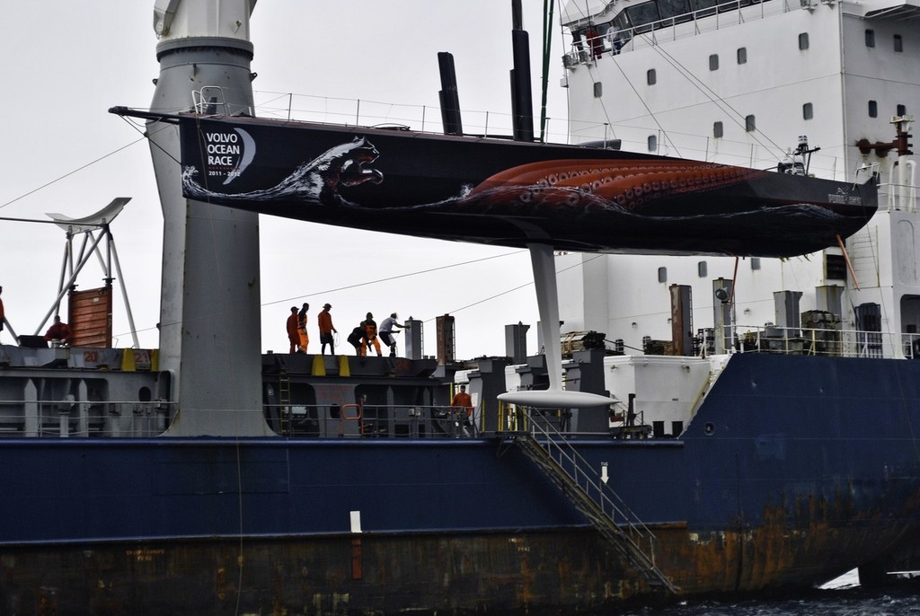 PUMA Ocean Racing powered by BERG is loaded onto a container ship just off the island of Tristan da Cunha to go to Cape Town, South Africa. (Credit: Tristan da Cunha) © Amory Ross/Puma Ocean Racing/Volvo Ocean Race http://www.puma.com/sailing