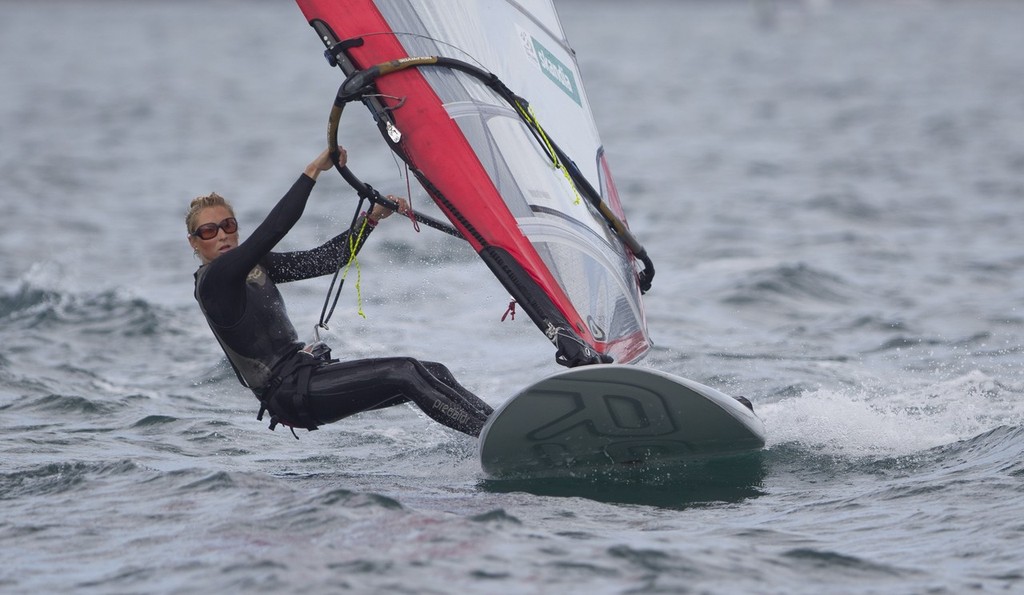 <br />
Natalia Kosinska from New Zealand racing in the RSX Women class on day 2 of the Skandia Sail for Gold Regatta, in Weymouth and Portland, the 2012 Olympic venue.  © onEdition http://www.onEdition.com