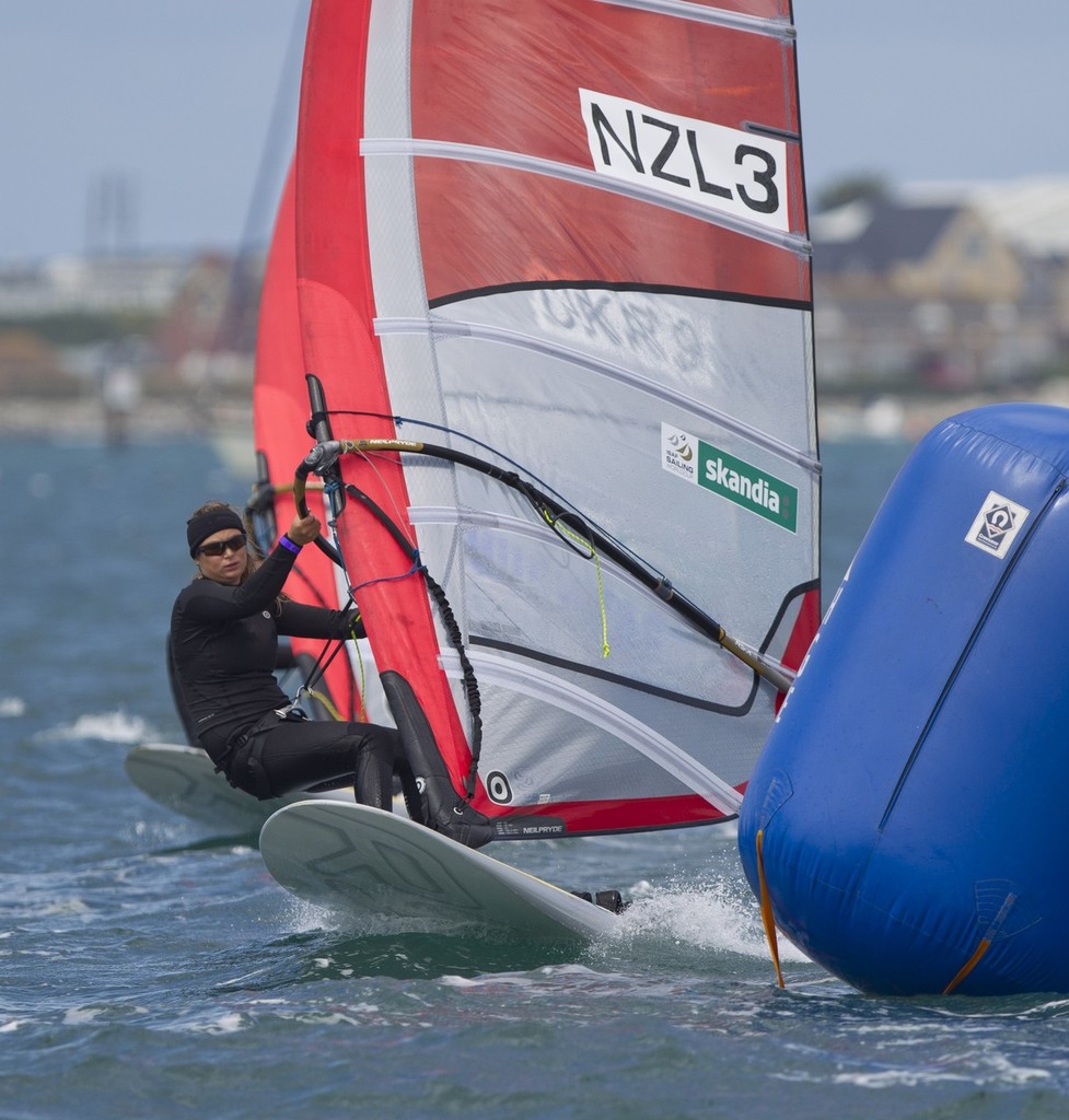 Steffanie Williams from New Zealand racing in the RSX Women class on day 2 of the Skandia Sail for Gold Regatta, in Weymouth and Portland, the 2012 Olympic venue.  © onEdition http://www.onEdition.com