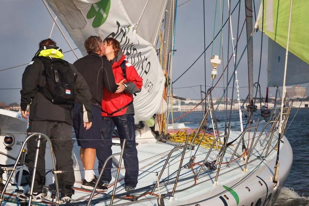Skipper Derek Hatfield is greeted by his wife Patianne as he celebrates finishing in second place in Ocean Sprint 4.<br />
 &copy; Ainhoa Sanchez/Velux 5 Oceans