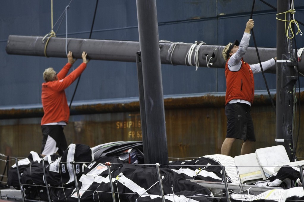 PUMA Ocean Racing powered by BERG Propulsion's mar mostro is loaded onto the container ship Team Bremen, just off the island of Tristan da Cunha, ready for the trip back to Cape Town, South Africa to join the rest of the Volvo Ocean Race 2011-12 fleet for the start of leg 2. (Credit: Amory Ross/PUMA Ocean Racing/Volvo Ocean Race) photo copyright Amory Ross/Puma Ocean Racing/Volvo Ocean Race http://www.puma.com/sailing taken at  and featuring the  class