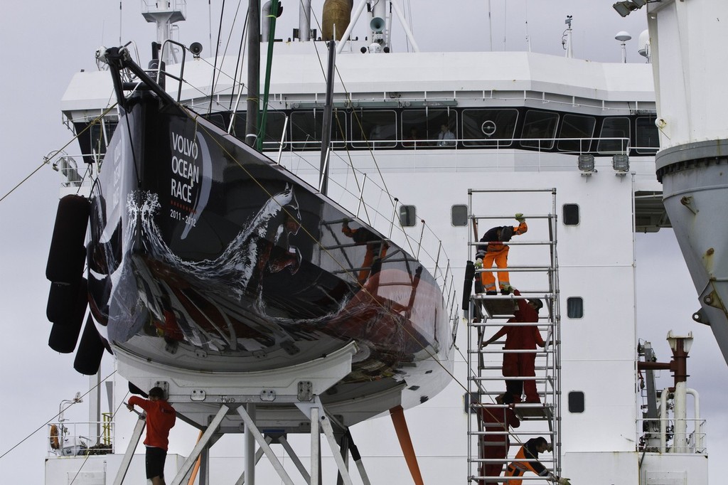 PUMA Ocean Racing powered by BERG Propulsion’s mar mostro is loaded onto the container ship Team Bremen, just off the island of Tristan da Cunha, ready for the trip back to Cape Town, South Africa to join the rest of the Volvo Ocean Race 2011-12 fleet for the start of leg 2.  © Amory Ross/Puma Ocean Racing/Volvo Ocean Race http://www.puma.com/sailing