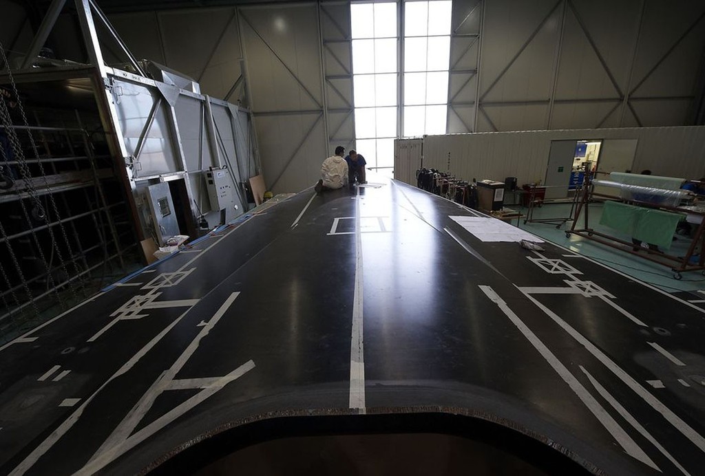 Groupama 4 being build at MULTIPLAST in Vannes, France, for the Volvo Ocean Race 2011-12.  © Yvan Zedda http://www.zedda.com.