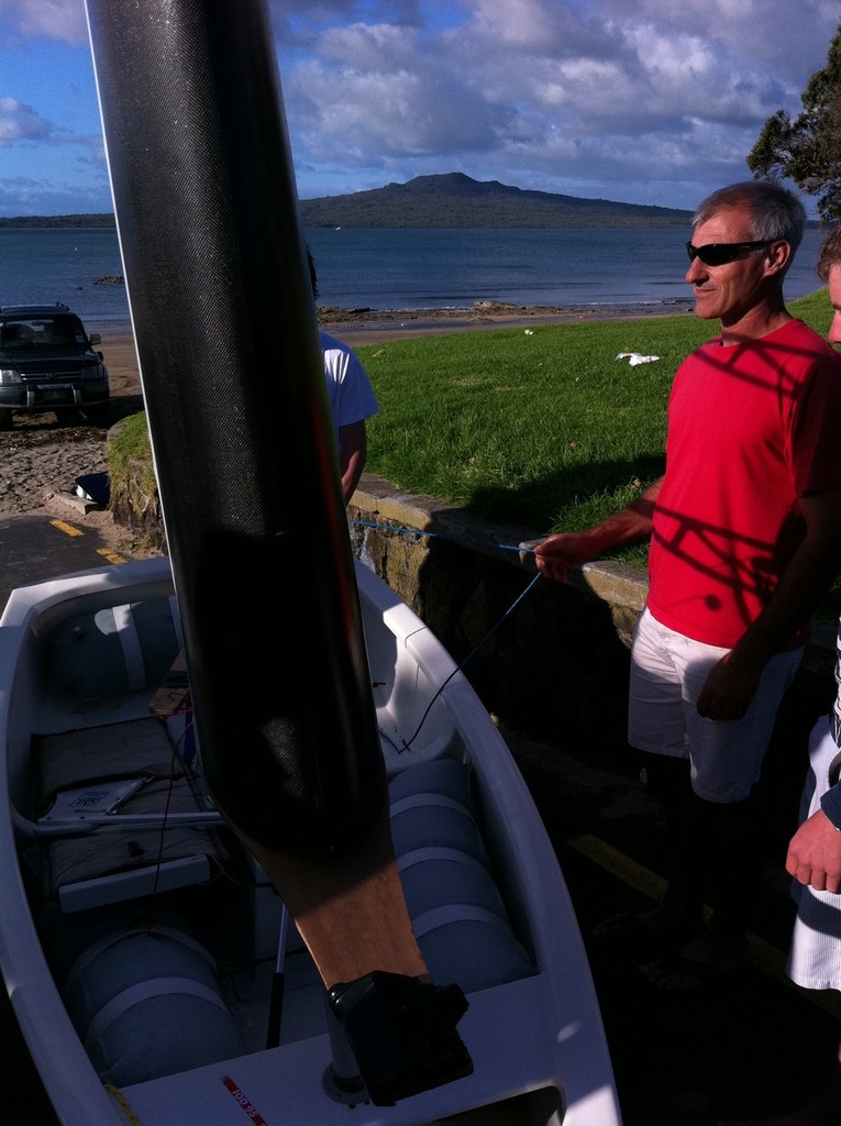 Oracle Racing Technical Director Mike Drummond checks the wingsailed Optimist - Toyota Optimist Nationals 2011. Image:- Nick Glanfield © SW