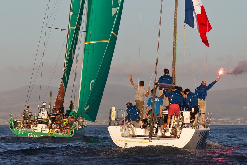 Groupama Sailing Team, skippered by Franck Cammas on her way to finish third on leg 1 of the Volvo Ocean Race 2011-12, from Alicante, Spain, to Cape Town, South Africa at 17:28:31 UTC.  © Ian Roman/Volvo Ocean Race http://www.volvooceanrace.com