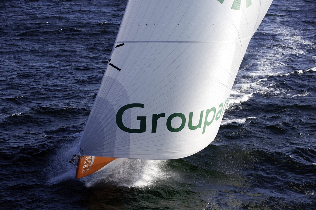 Groupama Sailing Team, skippered by Franck Cammas on her way to finish third on leg 1 of the Volvo Ocean Race 2011-12, from Alicante, Spain, to Cape Town, South Africa at 17:28:31 UTC.  © Paul Todd/Volvo Ocean Race http://www.volvooceanrace.com