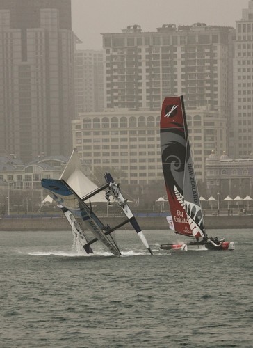 The Wave, Muscat capsize in Race 2 - Extreme Sailing 2011 - Day 3, Qingdao © Sui Zhi Qiang/Lloyd Images  © Lloyd Images http://lloydimagesgallery.photoshelter.com/