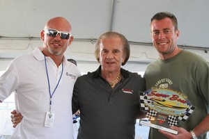 Performance boating legend Reggie Fountain (centre) with the happy crew of the winning 'Cintron.' - Clearwater offshore race photo copyright Rodrick Cox taken at  and featuring the  class