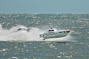 'Watch Your Back' flies high on the way to victory in Superboat Vee Limited. - Clearwater offshore race photo copyright Rodrick Cox taken at  and featuring the  class