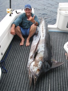 Looking like a winner and $20,000 richer was Mark Foy after taking the Isuzu Heaviest Marlin form the boat 'Seaka.' photo copyright BlueWater Power Yachts taken at  and featuring the  class
