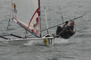 Britain's Tom Conway goes back ashore in the rain squall. - Musto Performance Skiffs Worlds photo copyright  John Curnow taken at  and featuring the  class