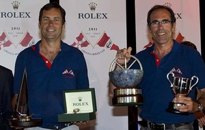 Dominique Heyraud, Owner of Foxy Lady and co-skipper Michel Heyraud, overall winners, receive a Rolex timepiece - Giraglia Rolex Cup 2011  
 photo copyright  Rolex / Carlo Borlenghi http://www.carloborlenghi.net taken at  and featuring the  class