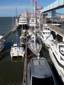 One of Dockwise Yacht Transport’s semi-submersible carriers, Super Servant 4, is shown in Brisbane (2006) fully submerged.  Super Servant 3 is due to arrive in Brisbane in late January of 2011.  - Dockwise Yacht Transport photo copyright Barby MacGowan taken at  and featuring the  class