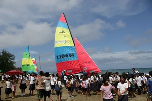 Children welcome the boats on Sibuyan Island - Philippine Hobie Challenge 2011 photo copyright Philippine Hobie Challenge Foundation taken at  and featuring the  class