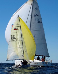 Sail Mooloolaba 2010 small and boats cross paths in stunning winter weather photo copyright Peter Duncan http://www.questphoto.net taken at  and featuring the  class