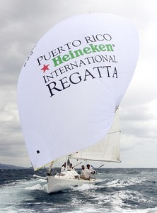The Puerto Rico Heineken International regatta, Race day 3, at the Palmas Del Mar Yacht Club, 20 to 25 knots of  wind and rain squalls blowing through the race course made tough sailing for the competitors. photo copyright Bob Grieser/Outside Images www.outsideimages.com taken at  and featuring the  class