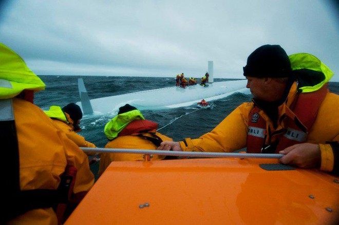 Rambler 100 capsize Fastnet Rock August 2011 © Nigel Millard/RNLI Baltimore http://www.baltimorelifeboat.ie/