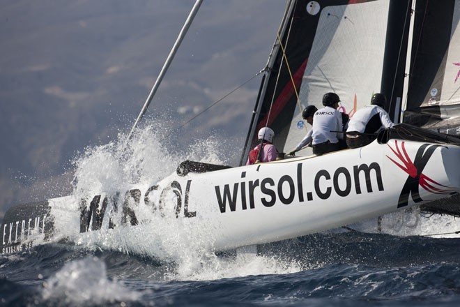 A 5th man having a wet and wild ride on an Extreme 40 during racing on day 4<br />
<br />
 - Extreme Sailing Series Act 8 2011 © Lloyd Images http://lloydimagesgallery.photoshelter.com/