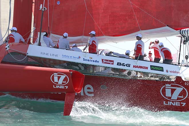 Team Vodafone crew busy  Airlie Beach 22nd Annual Race Week 2011 © Teri Dodds - copyright http://www.teridodds.com