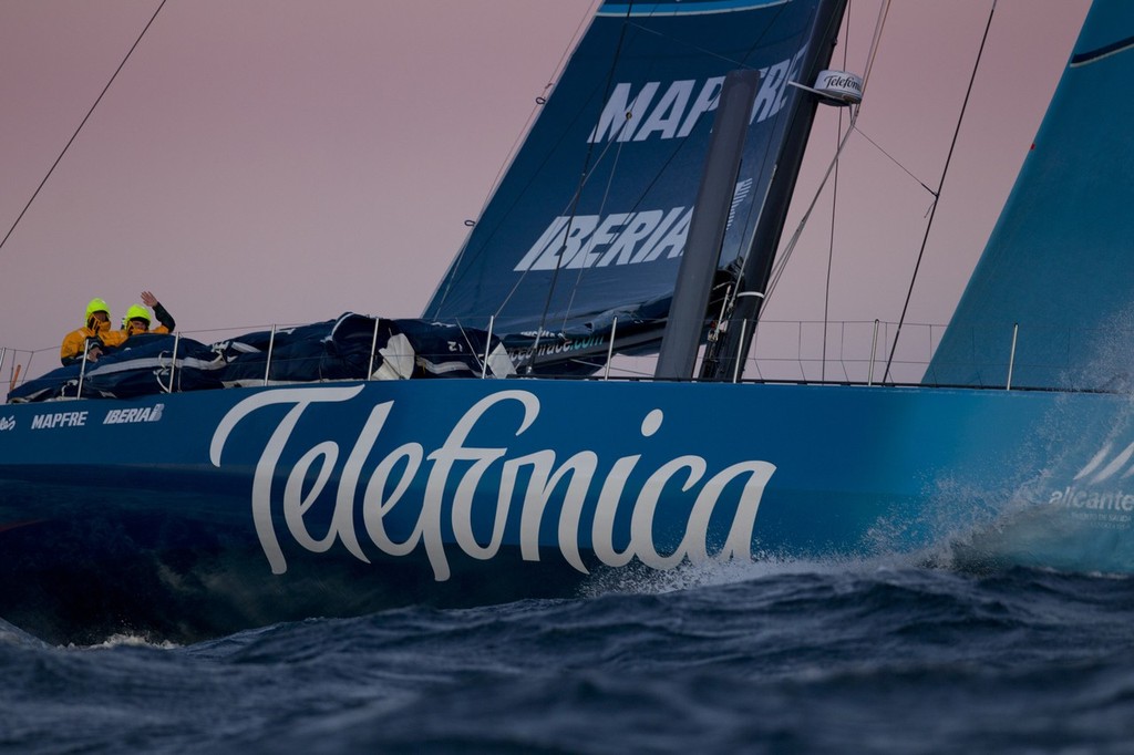 Team Telefonica on their way to Gibraltar at sunset, on leg 1 of the Volvo Ocean Race 2011-12 from Alicante, Spain to Cape Town, South Africa. © Maria Muina/Equipo Telefonica