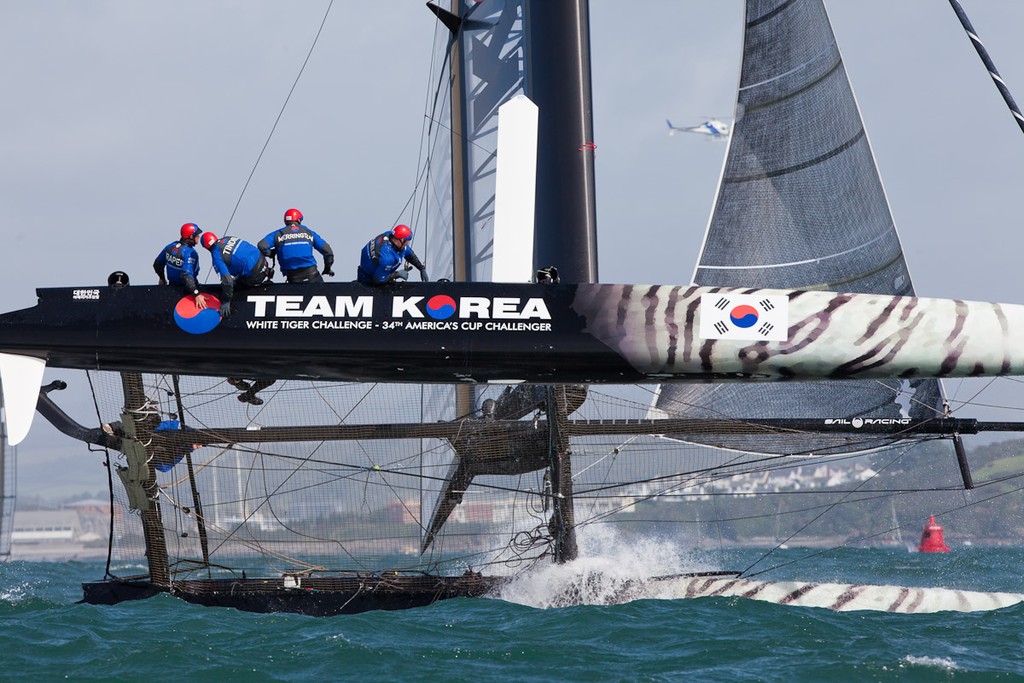 Team Korea capsizing at the top mark - America’s Cup World Series Plymouth 2011 © Sander van der Borch http://www.sandervanderborch.com