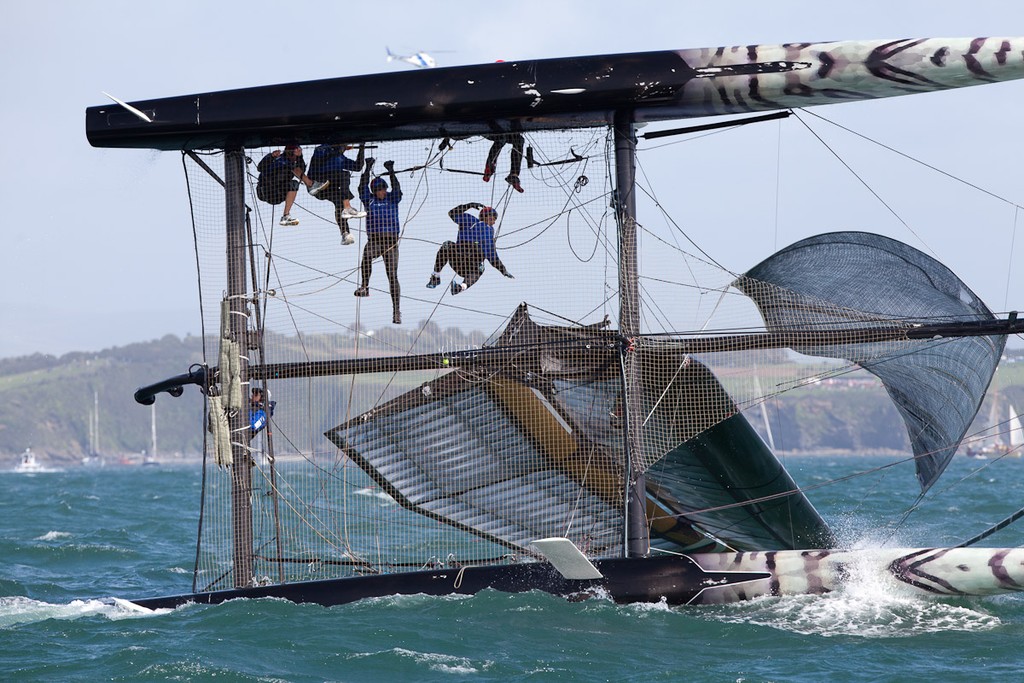 Team Korea capsizing at the top mark - America’s Cup World Series Plymouth 2011 © Sander van der Borch http://www.sandervanderborch.com