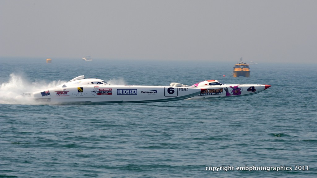 'The Good Guys' (Supercat Lite) naturally proves too good for 'Hog's Breath' (Supercat Outboard Lite) during the Redcliffe GP. - Redcliffe Offshore Race photo copyright Reg Blunt http://www.embphotographics.com.au taken at  and featuring the  class