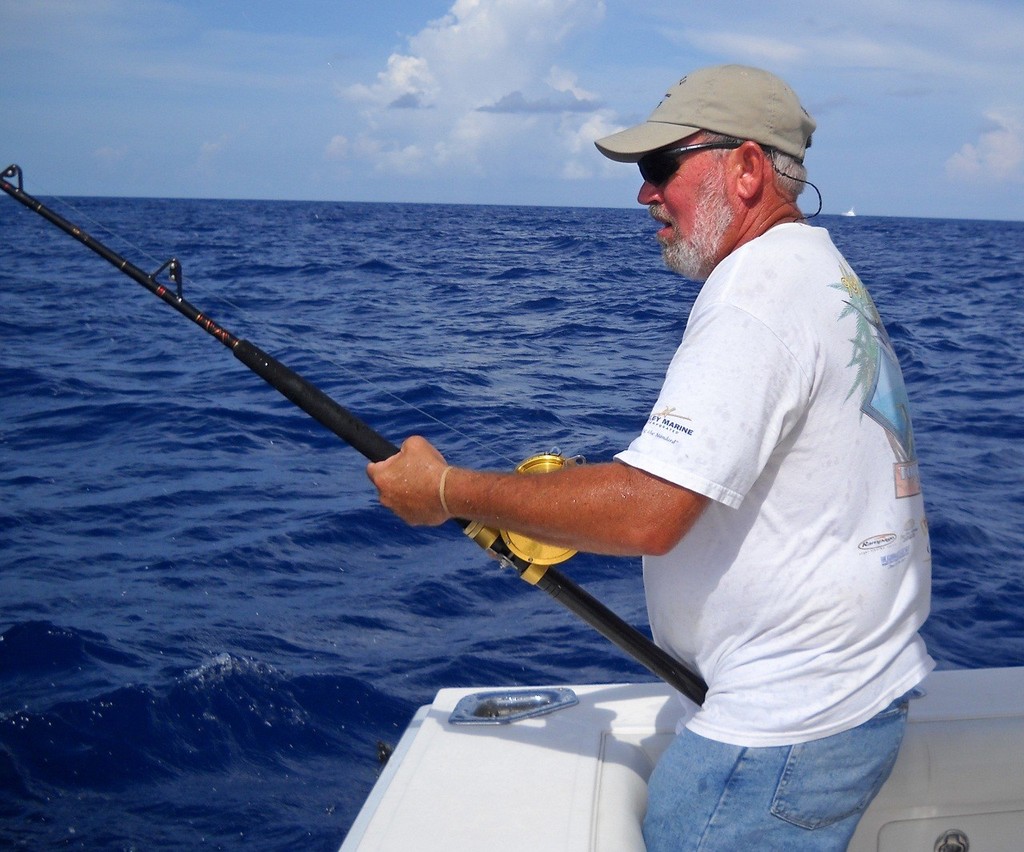 Harry Cameron reels in his $25,000 blue marlin. - Key West Marlin photo copyright Andy Newman / Florida Keys News Bureau taken at  and featuring the  class